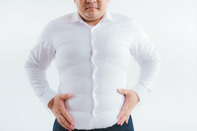 Lượng mỡ thừa lớn gây tác động xấu đến đời sống tình dục nam giới. Ảnh: Shutterstock